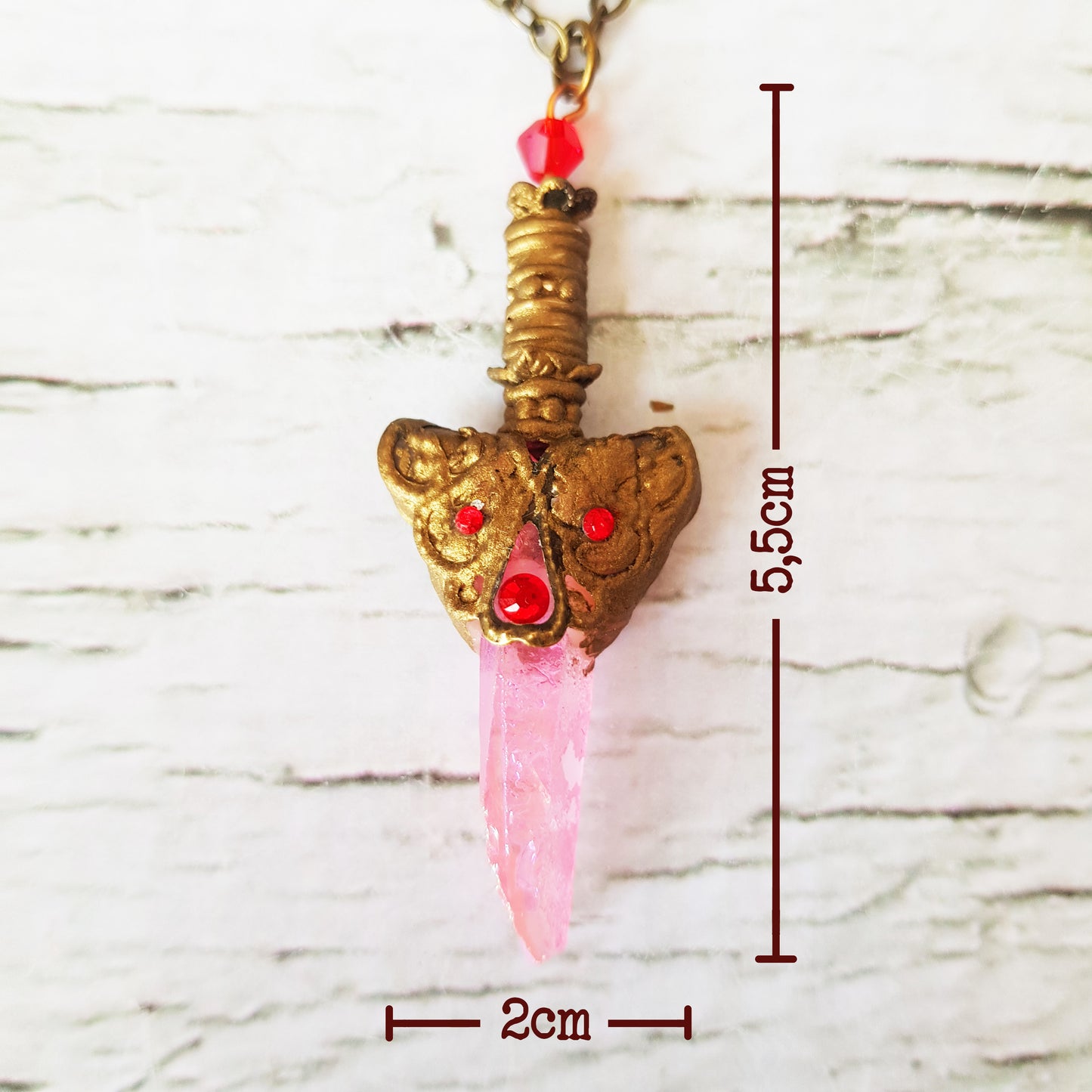 Pendentif: Épée de cristaux