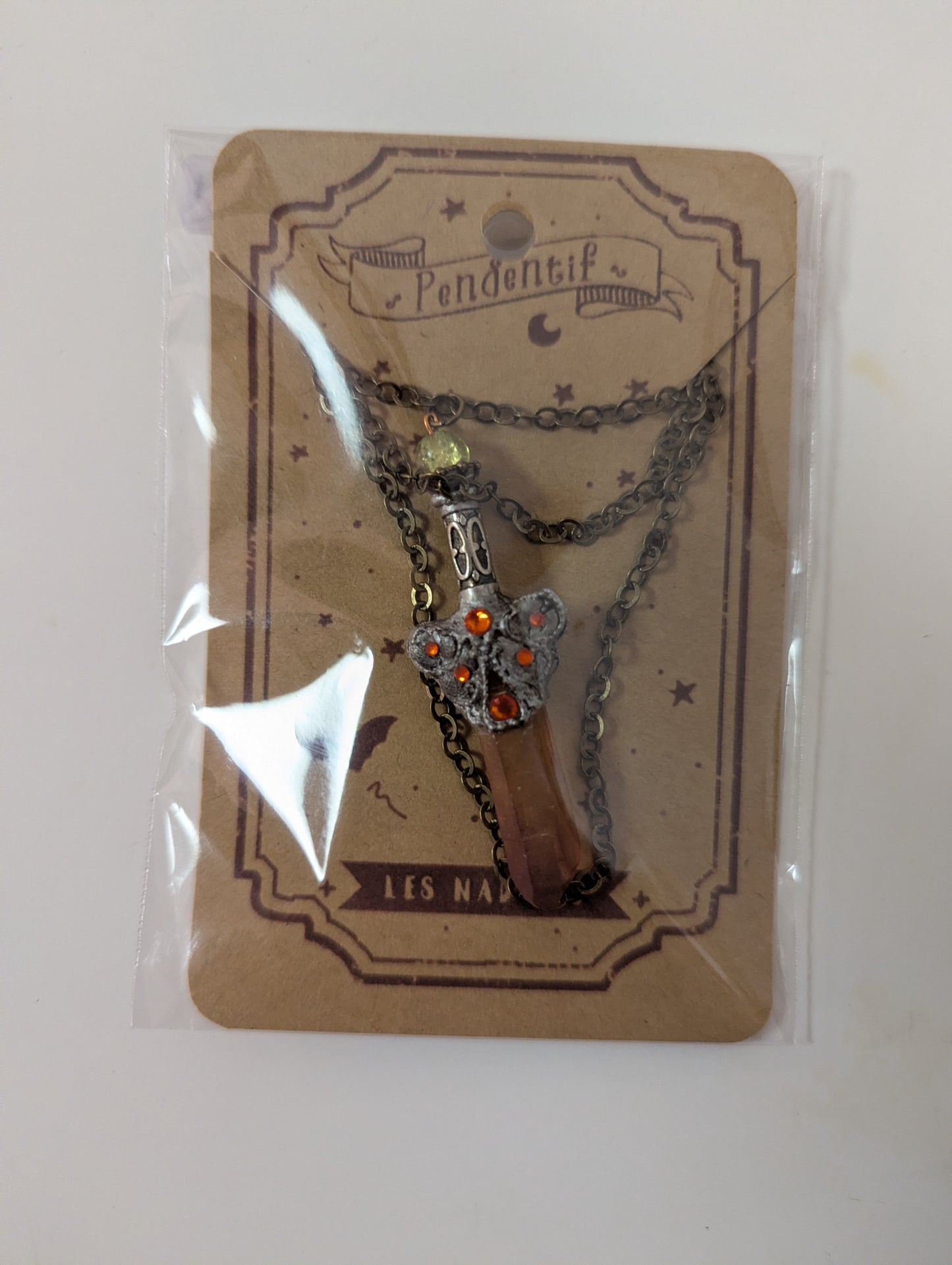 Pendentif: Épée de cristaux